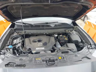 2021 Mazda CX-9 Sport with VIN JM3TCABY6M0522352, listed as a IAAI auction lot 42613136 with 106,167 mi miles and . Bid and sale history available at DreamBid. Image 10.