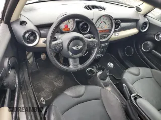 2012 MINI Hardtop S with VIN WMWSV3C53CTY27834, listed as a Copart auction lot 52616845 with 66,919 mi miles and Salvage Title. Bid and sale history available at DreamBid. Image 8.