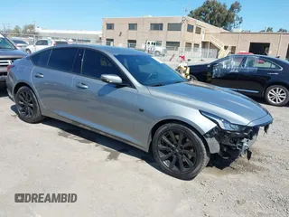 2023 Cadillac CT5 Luxury z VIN 1G6DW5RK7P0146345, wystawiony jako IAAI lot #41862152 z przebiegiem 18 902 mil mil oraz . Historia ofert i sprzedaży dostępna na DreamBid. Obrazek 1.