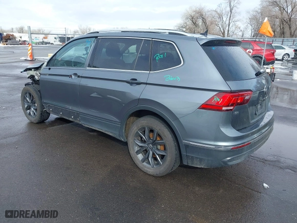 2022 Volkswagen Tiguan SE with VIN 3VV2B7AX2NM161365, listed as a IAAI auction lot 41588795 with 57,138 mi miles. Bid and sale history available at carsss.com. Image 3.
