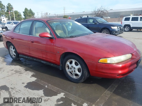 1999 Oldsmobile Intrigue GL z VIN 1G3WS52H1XF363368, wystawiony jako IAAI lot #41611295 z przebiegiem 83 232 mil mil oraz . Historia ofert i sprzedaży dostępna na DreamBid. Obrazek 1.