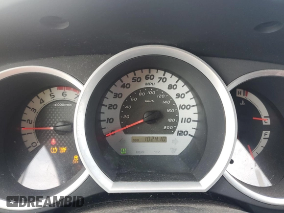 2013 Toyota Tacoma z VIN 5TFUU4EN2DX052230, wystawiony jako Copart lot #43802675 z przebiegiem 102 410 mil mil oraz Szkoda całkowita • Salvage title. Historia ofert i sprzedaży dostępna na DreamBid. Obrazek 9.
