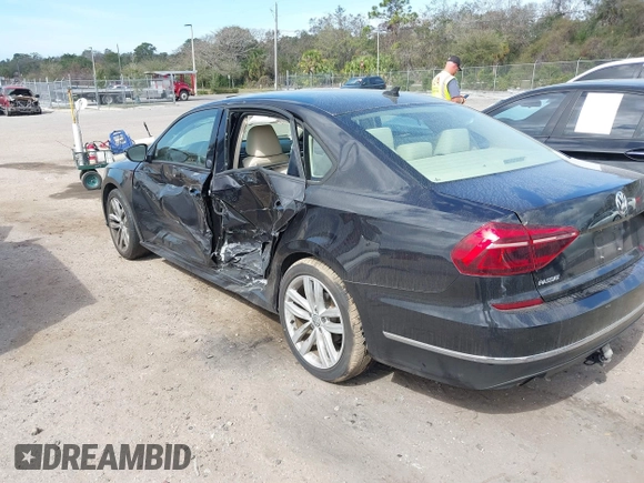 2019 Volkswagen Passat 2.0T Wolfsburg Edition with VIN 1VWLA7A34KC012694, listed as a IAAI auction lot 41579392 with 80,846 mi miles. Bid and sale history available at carsss.com. Image 3.
