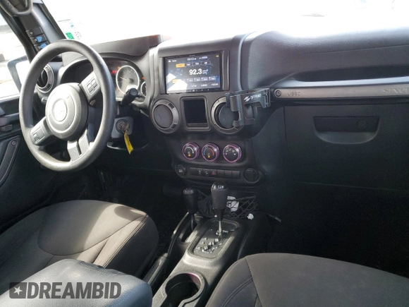 2017 Jeep Wrangler Unlimited Sport with VIN 1C4BJWDG8HL680627, listed as a Copart auction lot 61241735 with 100,890 mi miles and Salvage title. Bid and sale history available at DreamBid. Image 8.