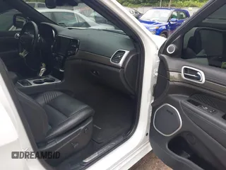 2021 Jeep Grand Cherokee Trackhawk with VIN 1C4RJFN95MC843131, listed as a IAAI auction lot 42688185 with 16,391 mi miles and . Bid and sale history available at DreamBid. Image 5.