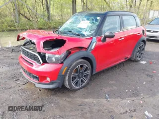 2014 MINI Countryman S with VIN WMWZC3C52EWP29433, listed as a IAAI auction lot 42179585 with 179,871 mi miles and . Bid and sale history available at DreamBid. Image 2.