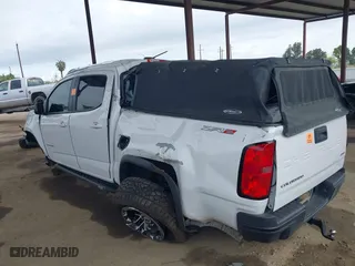 2021 Chevrolet Colorado 4WD ZR2 with VIN 1GCGTEEN1M1299246, listed as a IAAI auction lot 41910590 with 36,177 mi miles. Bid and sale history available at carsss.com. Image 3.