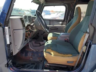 1997 Jeep Wrangler SE with VIN 1J4FY29P2VP446786, listed as a Copart auction lot 52295305 with 0 mi miles and Salvage Title. Bid and sale history available at carsss.com. Image 7.