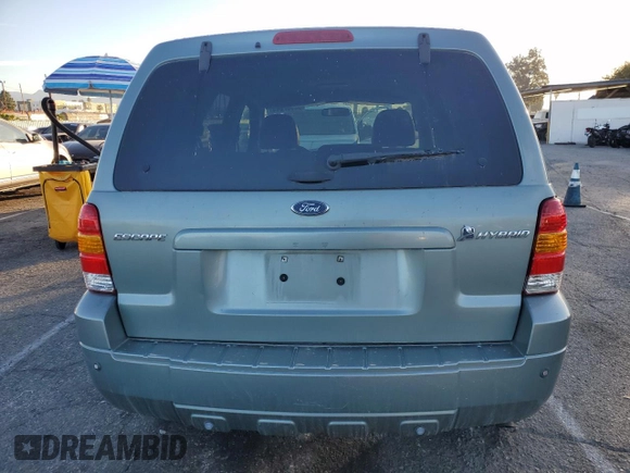 2006 Ford Escape Hybrid with VIN 1FMCU95H26KB36742, listed as a Copart auction lot 82902014 with 139,103 mi miles and Clean title. Bid and sale history available at DreamBid. Image 6.
