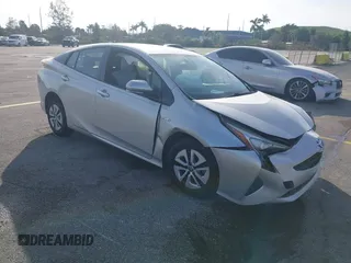 2016 Toyota Prius Four with VIN JTDKARFU1G3009156, listed as a IAAI auction lot 40906451 with 67,449 mi miles. Bid and sale history available at carsss.com. Image 1.