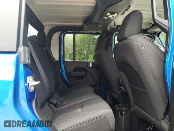 2023 Jeep Gladiator Sport S with VIN 1C6HJTAG3PL593284, listed as a Copart auction lot 57292935 with Not provided miles and Salvage title. Bid and sale history available at DreamBid. Image 10.