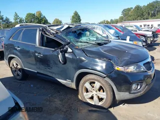 2013 Kia Sorento EX with VIN 5XYKUDA22DG412022, listed as a IAAI auction lot 40567674 with 177,189 mi miles. Bid and sale history available at carsss.com. Image 13.