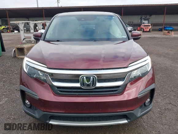 2021 Honda Pilot EX-L with VIN 5FNYF6H53MB094015, listed as a IAAI auction lot 42545722 with 66,065 mi miles and . Bid and sale history available at DreamBid. Image 12.