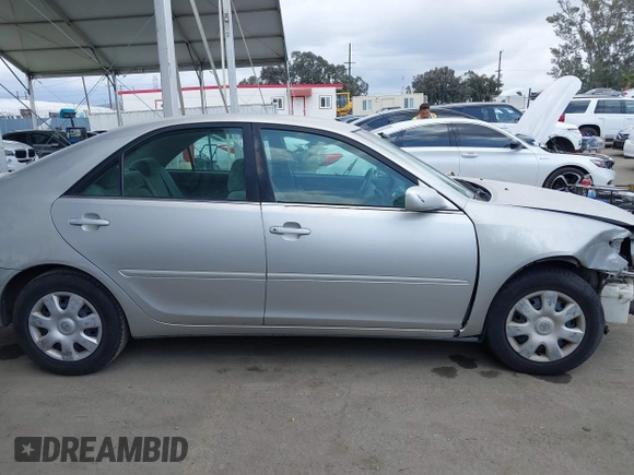 2004 Toyota Camry LE with VIN 4T1BE32K34U857725, listed as a IAAI auction lot 42131740 with 107,975 mi miles and . Bid and sale history available at DreamBid. Image 14.