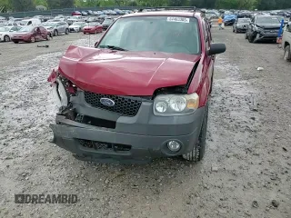 2006 Ford Escape XLT with VIN 1FMYU931X6KD09919, listed as a Copart auction lot 54403305 with 143,399 mi miles and Salvage title. Bid and sale history available at DreamBid. Image 14.