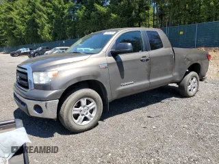 2012 Toyota Tundra with VIN 5TFUY5F18CX251643, listed as a Copart auction lot 63042765 with 142,693 mi miles and Salvage title. Bid and sale history available at DreamBid. Image 1.