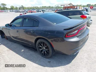 2015 Dodge Charger SE z VIN 2C3CDXBGXFH751491, wystawiony jako IAAI lot #41907243 z przebiegiem 112 545 mil mil oraz . Historia ofert i sprzedaży dostępna na DreamBid. Obrazek 3.
