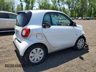 2016 Smart fortwo Passion z VIN WMEFJ5DA5GK123218, wystawiony jako Copart lot #58978095 z przebiegiem 73 608 mil mil oraz Szkody całkowita. Historia ofert i sprzedaży dostępna na DreamBid. Obrazek 3.