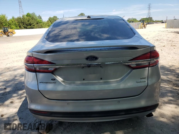 2018 Ford Fusion SE z VIN 3FA6P0HD3JR238137, wystawiony jako Copart lot #54828205 z przebiegiem 131 221 mil mil oraz Szkoda całkowita • Salvage title. Historia ofert i sprzedaży dostępna na DreamBid. Obrazek 6.
