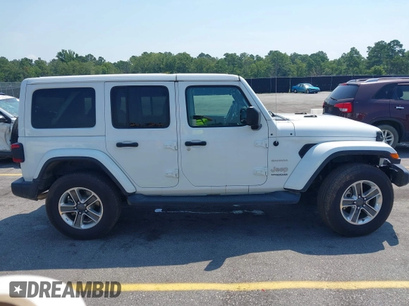 2018 Jeep Wrangler Unlimited Sahara with VIN 1C4HJXEG6JW112976, listed as a IAAI auction lot 42559123 with 76,066 mi miles and . Bid and sale history available at DreamBid. Image 13.