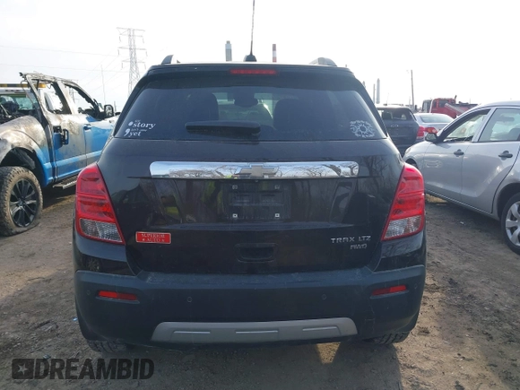 2015 Chevrolet Trax LTZ with VIN KL7CJTSB9FB101817, listed as a IAAI auction lot 41090727 with 108,959 mi miles. Bid and sale history available at carsss.com. Image 16.