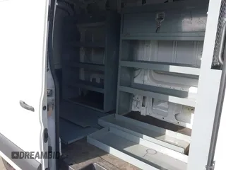 2015 Ford Transit z VIN 1FTSW2XM2FKA02969, wystawiony jako IAAI lot #42515290 z przebiegiem 166 292 mil mil oraz . Historia ofert i sprzedaży dostępna na DreamBid. Obrazek 8.