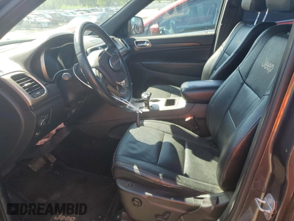 2014 Jeep Grand Cherokee Laredo with VIN 1C4RJEAG0EC388611, listed as a Copart auction lot 53663495 with Not Provided miles and Salvage Title. Bid and sale history available at DreamBid. Image 7.