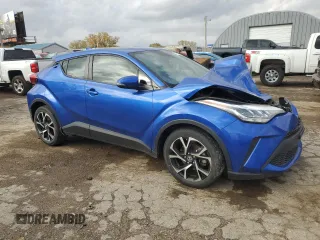 2021 Toyota C-HR LE with VIN JTNKHMBX2M1107890, listed as a Copart auction lot 77992554 with 54,219 mi miles and Salvage Title. Bid and sale history available at carsss.com. Image 4.
