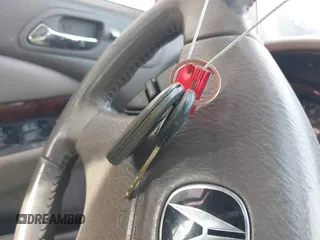 2003 Acura TL w/Navigation System z VIN 19UUA56713A007586, wystawiony jako IAAI lot #42348174 z przebiegiem Nie podano mil oraz . Historia ofert i sprzedaży dostępna na DreamBid. Obrazek 11.
