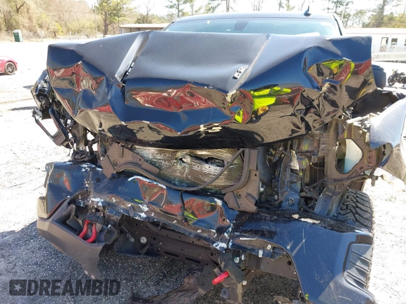 2021 Chevrolet Silverado 1500 LT Trail Boss with VIN 3GCPYFEL7MG362034, listed as a IAAI auction lot 41661545 with 86,749 mi miles and . Bid and sale history available at DreamBid. Image 6.