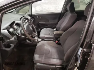 2009 Honda Fit with VIN JHMGE88259S053426, listed as a Copart auction lot 87894815 with 143,665 mi miles and Salvage Title. Bid and sale history available at carsss.com. Image 7.