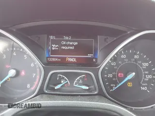 2015 Ford Focus SE with VIN 1FADP3F29FL244041, listed as a IAAI auction lot 42053303 with 132,804 mi miles and . Bid and sale history available at DreamBid. Image 7.
