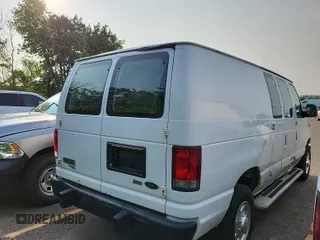 2014 Ford Econoline Cargo Commercial z VIN 1FTNE2EW0EDA95532, wystawiony jako IAAI lot #42442160 z przebiegiem 140 667 mil mil oraz . Historia ofert i sprzedaży dostępna na DreamBid. Obrazek 34.