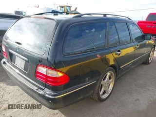 2001 Mercedes-Benz E-Class with VIN WDBJH65JX1B290284, listed as a IAAI auction lot 41713265 with 1 mi miles. Bid and sale history available at carsss.com. Image 4.