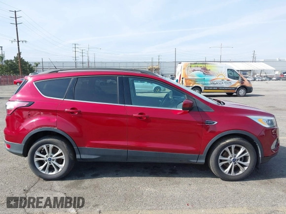 2017 Ford Escape SE with VIN 1FMCU0GD4HUC27041, listed as a IAAI auction lot 42127328 with 107,860 mi miles. Bid and sale history available at carsss.com. Image 13.