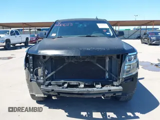 2015 Chevrolet Tahoe LS with VIN 1GNSCAKC5FR645736, listed as a IAAI auction lot 42064623 with 223,149 mi miles and . Bid and sale history available at DreamBid. Image 6.