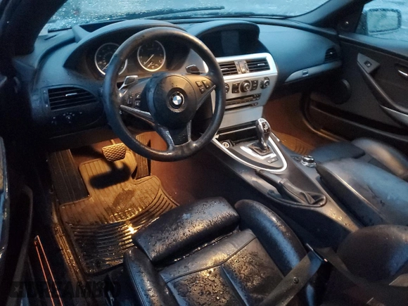 2009 BMW 6 Series 650i with VIN WBAEB53509C224236, listed as a Copart auction lot 86313444 with 82,024 mi miles and Salvage Title. Bid and sale history available at carsss.com. Image 8.