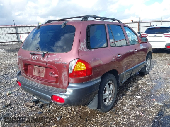 2002 Hyundai Santa Fe GLS z VIN KM8SC13D32U230286, wystawiony jako IAAI lot #41698433 z przebiegiem 151 183 mil mil oraz . Historia ofert i sprzedaży dostępna na DreamBid. Obrazek 4.