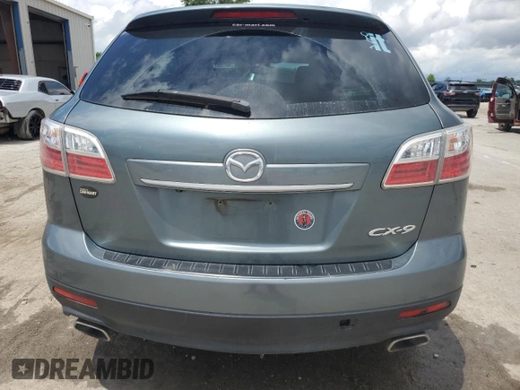 2012 Mazda CX-9 Grand Touring z VIN JM3TB2DA9C0350650, wystawiony jako Copart lot #60733775 z przebiegiem 246 128 mil mil oraz Szkoda całkowita • Salvage title. Historia ofert i sprzedaży dostępna na DreamBid. Obrazek 6.