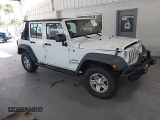 2015 Jeep Wrangler Unlimited Sport with VIN 1C4BJWDG2FL688994, listed as a IAAI auction lot 42400188 with 128,072 mi miles and . Bid and sale history available at DreamBid. Image 1.