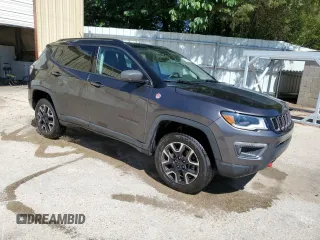 2021 Jeep Compass Trailhawk with VIN 3C4NJDDB7MT598280, listed as a Copart auction lot 58241695 with 116,928 mi miles and Salvage title. Bid and sale history available at DreamBid. Image 4.