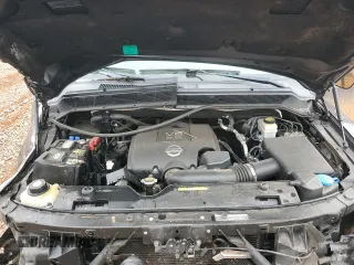 2015 Nissan Armada Platinum z VIN 5N1BA0NE6FN623527, wystawiony jako Copart lot #43061735 z przebiegiem 104 518 mil mil oraz Szkoda całkowita • Salvage title. Historia ofert i sprzedaży dostępna na DreamBid. Obrazek 13.