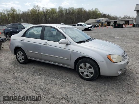 2004 Kia Spectra LX with VIN KNAFE121245031019, listed as a Copart auction lot 52960135 with 183,016 mi miles and Salvage Title. Bid and sale history available at carsss.com. Image 4.