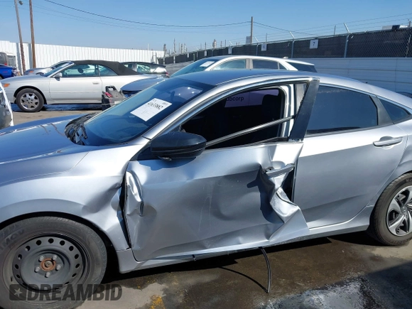 2020 Honda Civic LX with VIN 2HGFC2F6XLH533726, listed as a IAAI auction lot 41633882 with 141,835 mi miles and . Bid and sale history available at DreamBid. Image 6.