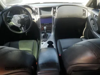 2014 Infiniti Q50 Premium with VIN JN1BV7AP2EM677469, listed as a Copart auction lot 61627125 with 106,670 mi miles and Salvage title. Bid and sale history available at DreamBid. Image 8.