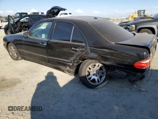 2001 Mercedes-Benz E-Class AWD with VIN WDBJF82JX1X044733, listed as a Copart auction lot 74825034 with 153,046 mi miles and Salvage Title. Bid and sale history available at carsss.com. Image 2.