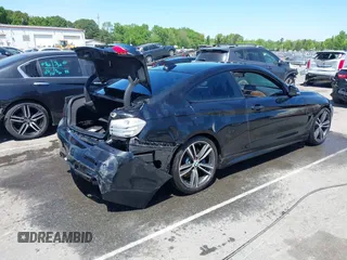 2015 BMW 4 Series 435i with VIN WBA3R1C56FK194060, listed as a IAAI auction lot 42061619 with 153,384 mi miles and . Bid and sale history available at DreamBid. Image 4.