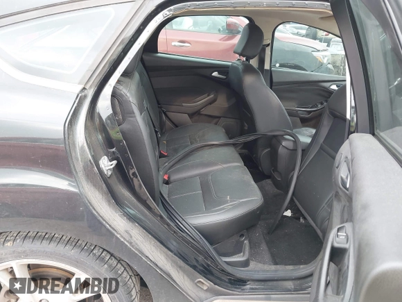 2015 Ford Focus Titanium с VIN 1FADP3N25FL374402, выставлен на аукционе IAAI как лот 42036678 с пробегом 85 785 миль миль и . История ставок и продаж доступна на DreamBid. Изображение 8.