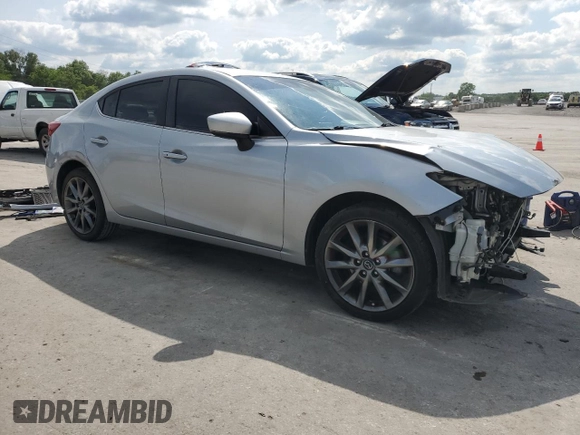 2018 Mazda 3 Touring with VIN 3MZBN1V33JM161893, listed as a Copart auction lot 56328615 with 103,827 mi miles and Salvage Title. Bid and sale history available at DreamBid. Image 4.