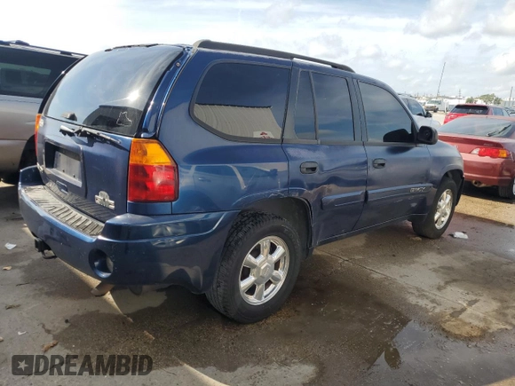 2004 GMC Envoy SLE with VIN 1GKDS13S842402250, listed as a Copart auction lot 54941005 with 163,380 mi miles and Salvage Title. Bid and sale history available at DreamBid. Image 3.